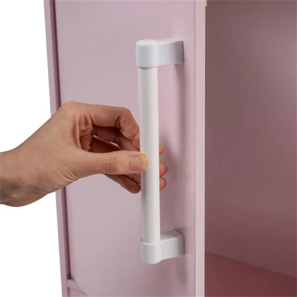 Hand opening a pink door with a white handle against a pink background