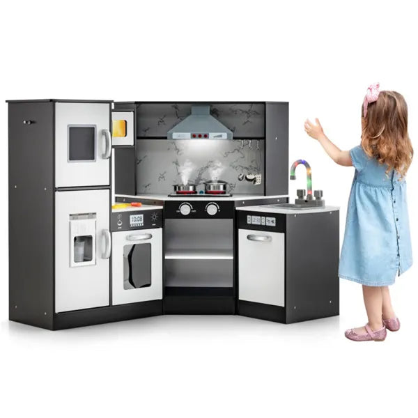 Children's play kitchen set with a girl interacting with it on a white background