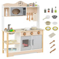 Wooden play kitchen set with accessories on a white background