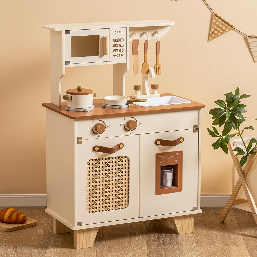Children's play kitchen set with wooden cabinets, sink, and appliances on a beige background.