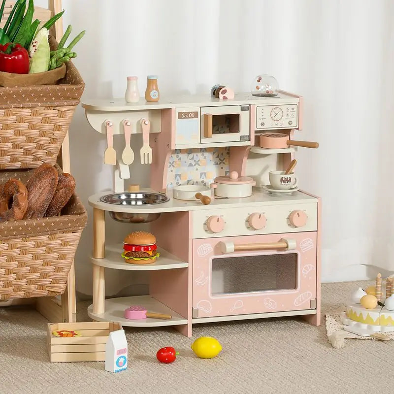 Children's play kitchen set with various accessories on a neutral background