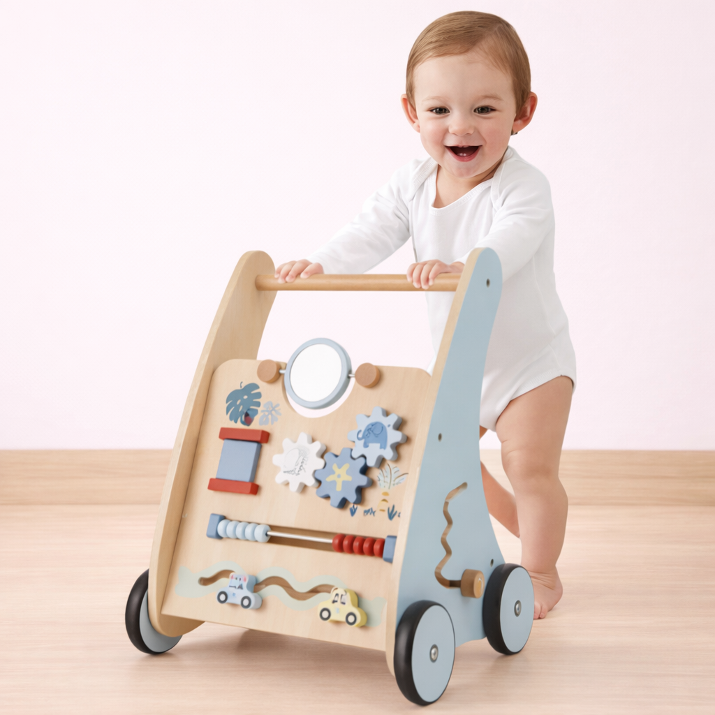 Child playing with a wooden toy walker on a light wooden floor.