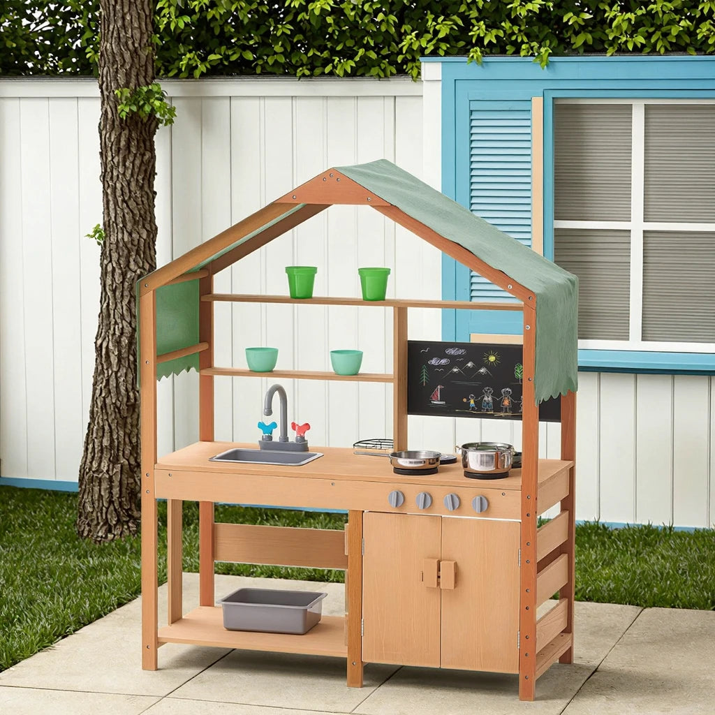 Wooden play kitchen set with accessories on a patio