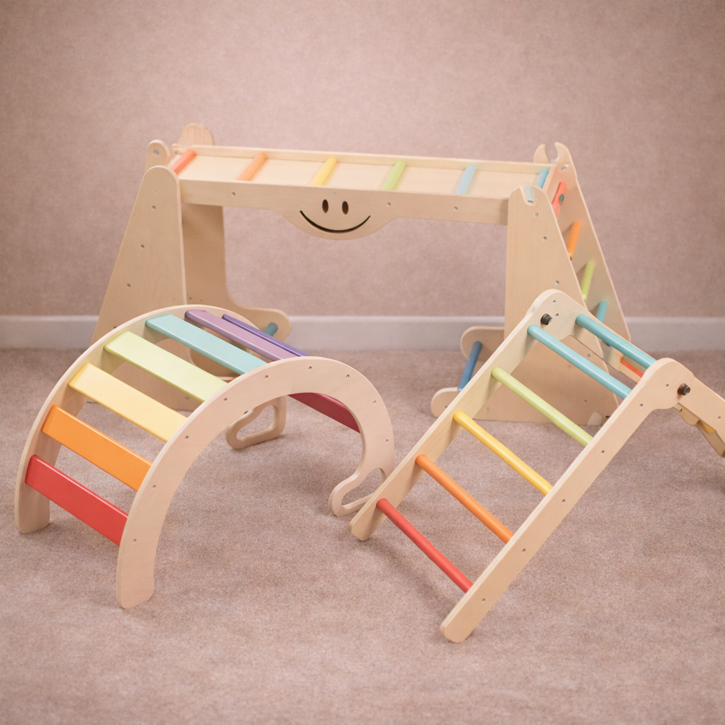 Children's wooden play set with rainbow-colored steps and a smiley face on a beige background