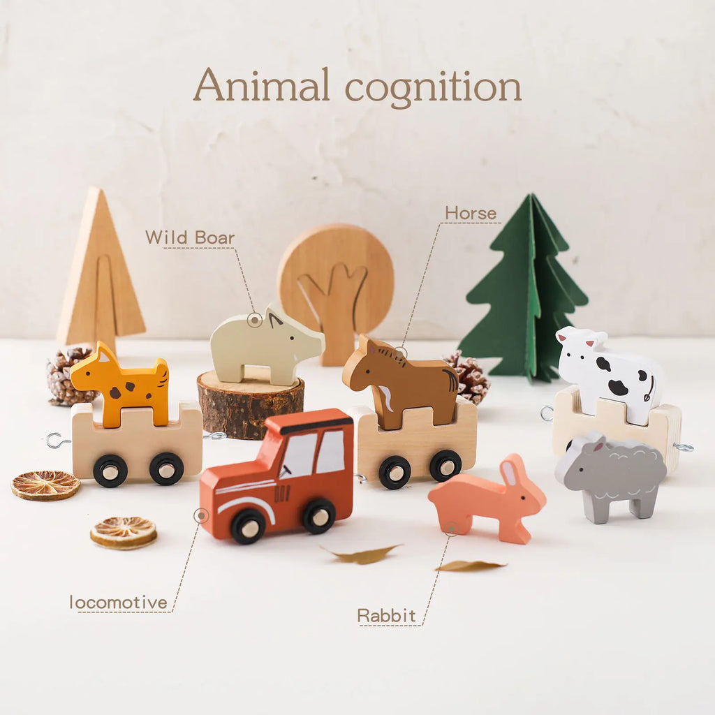 Set of wooden animal toys with labels on a white background