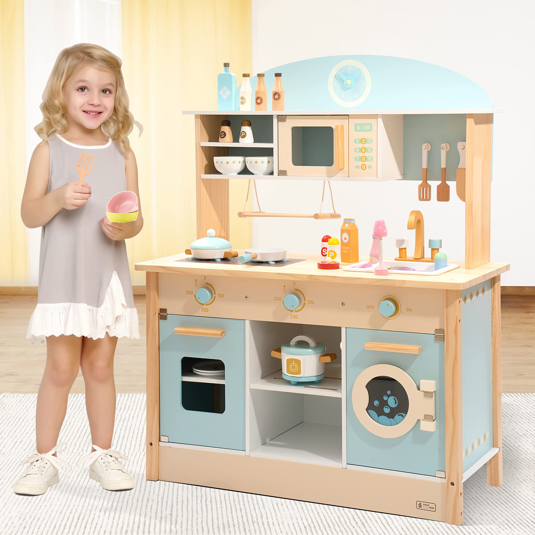 Child playing with a wooden toy kitchen set in a room.