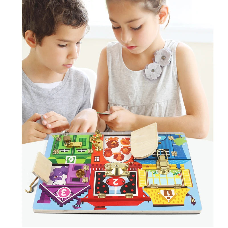 Two children playing with a colorful puzzle toy on a white surface.