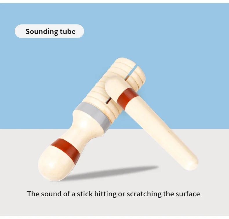 Wooden mallet with a red band on a light blue background